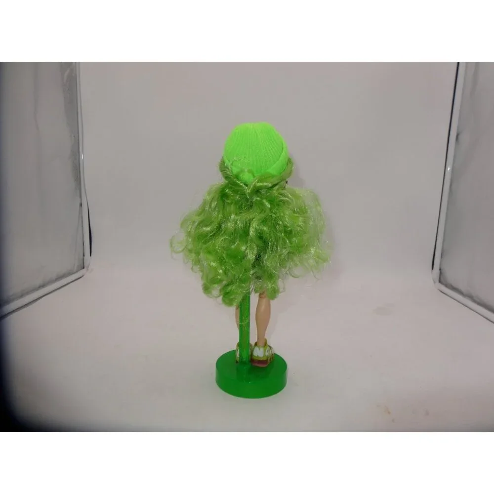 Rainbow High Jade Hunter Fashion Doll Dressed in Shorts Hat Jacket Top and Stand